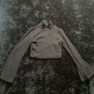 Cute Forever 21 turtle neck crop top with long flared sleeves.